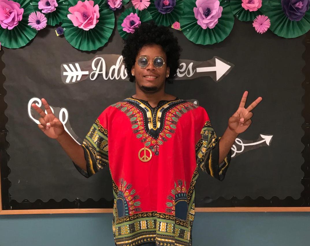 Senior Joseph Moore spreads peace, love, and good vibes on hippie day during homecoming spirit week.