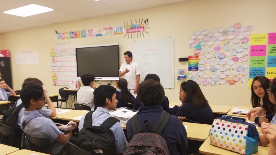 Interact clubs’ class president Andrey Cuevas Andreev gives a speech to the other club members. 