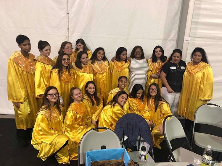 The choir waits backstage before they perform at Epcots Candlelight Processional on opening night.