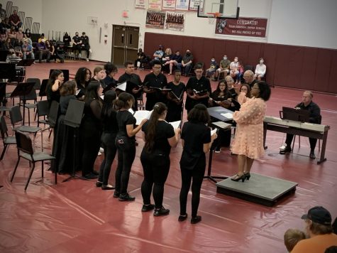 Choir guest performance at the holiday concert event singing Hallelujah with guests Scott and Joy Jolley, Parents of Civics teacher Camille Yeager, directed by choir instructor Ashly Thomas.