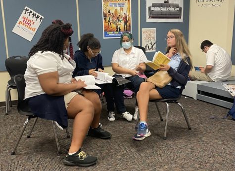 Students in thespians club rehearse their lines. 
