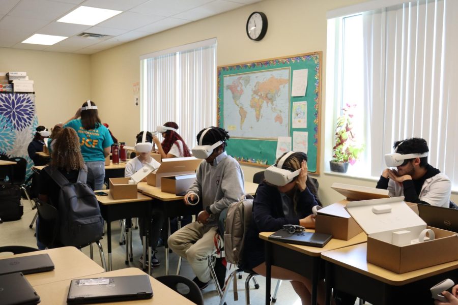 Students use virtual reality to see how boat activity affects oysters in the Indian River Lagoon.