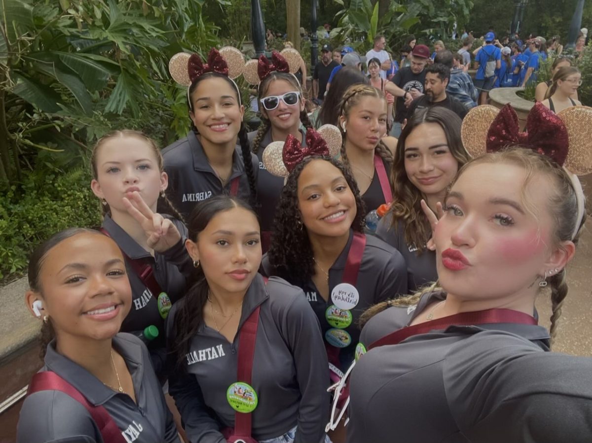 Senior cheerleader Isabella Hemenway posed with her teammates at Disney. (Isabella Hemenway) 