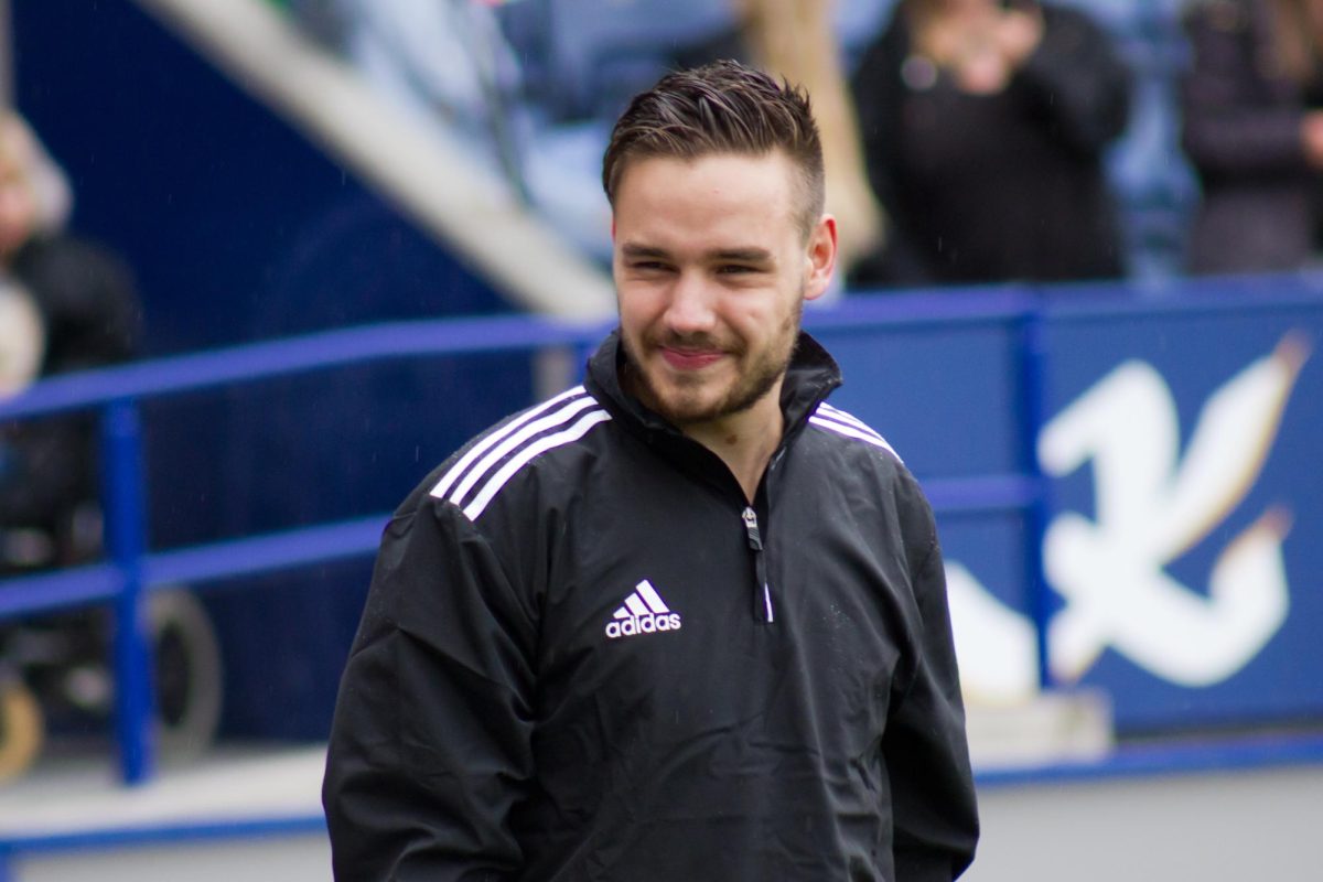 Liam Payne at a soccer match.