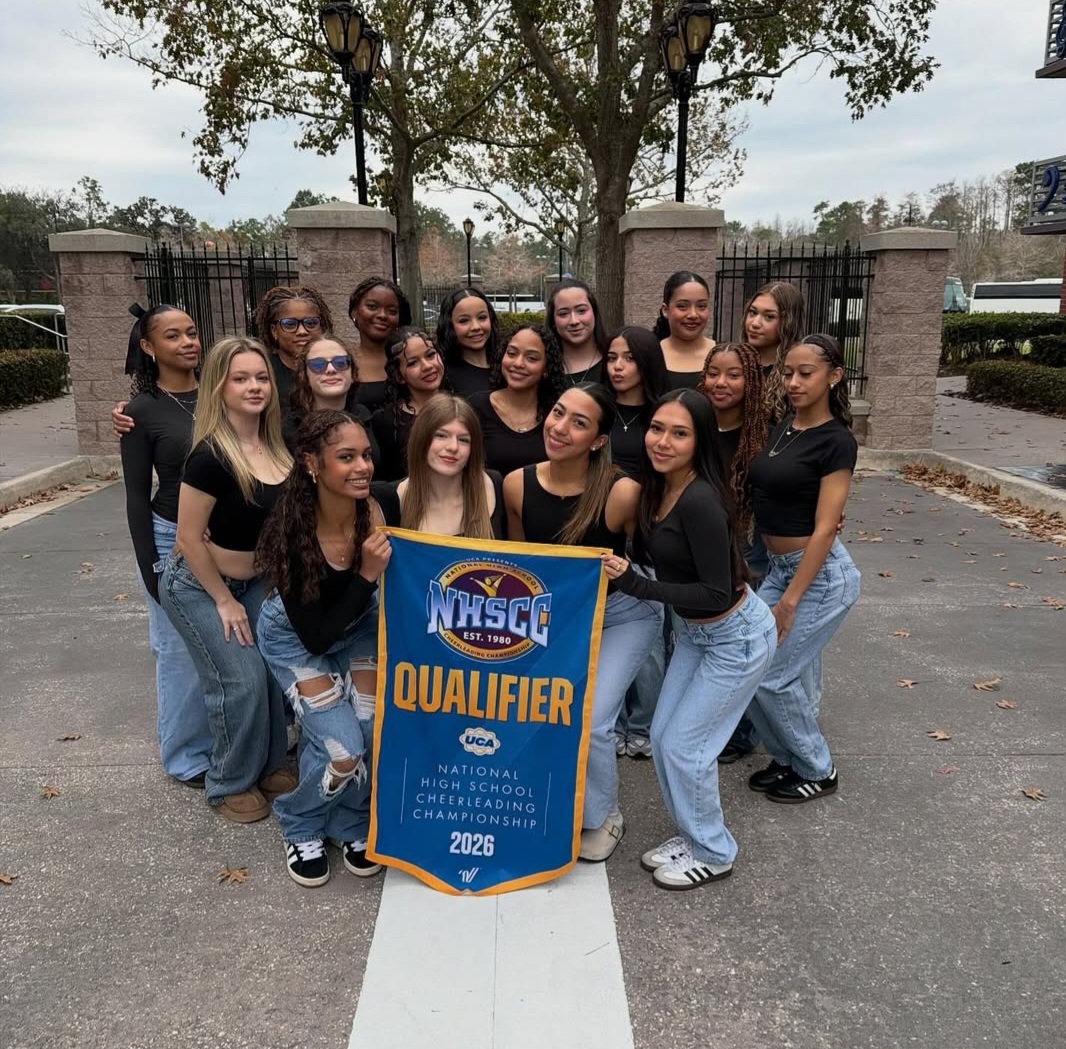The Four Corners Upper School Cheer Team together for Nationals.